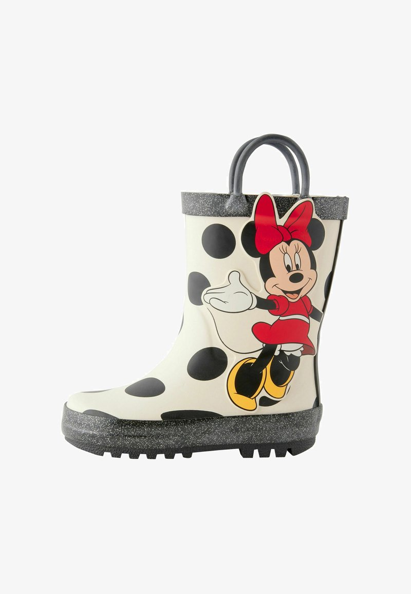 Children's rain boot with black polka dots on a white background, featuring a Minnie Mouse design, gray speckled sole, and side handles.