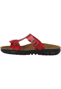 Red plastic sandals with two adjustable straps, cork footbed, and a black rubber sole featuring ridges for traction.