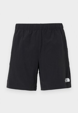 Sorte shorts laget av lettvektig materiale, med elastisk midje og en liten hvit logo på nedre høyre side.