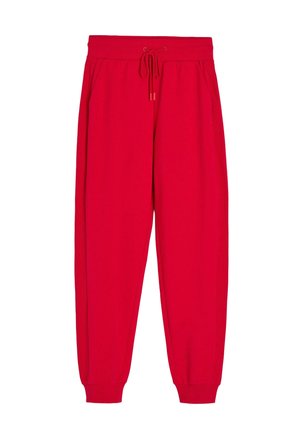 Czerwone spodnie dresowe z elastycznym pasem i sznurkiem do regulacji, bocznymi kieszeniami oraz ściągaczami przy nogawkach.