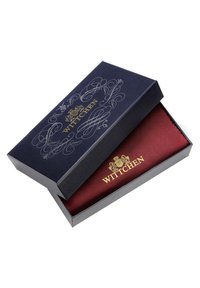 Scatola rettangolare blu con un elaborato design argentato e il logo "WITTCHEN" in oro. All'interno, una fodera in tessuto bordeaux aggiunge una nota di texture.