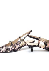 Zapatos slingback con estampado floral, punta afilada, tacón bajo y detalles en negro. Fabricados con material suave y con correas ajustables.