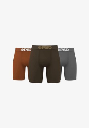 Three pairs of PSD boxer briefs in rust, dark brown, and gray colors, displayed side by side on a white background.