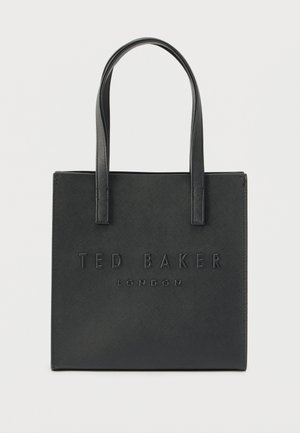 Mustast tekstuuritud materjalist käekott, esiküljel reljeefne "TED BAKER LONDON" logo ja kaks tugevat käepidet. Ruutkujuline.