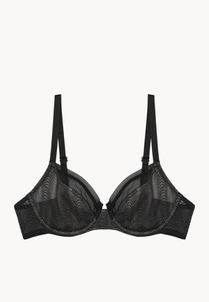 Soutien-gorge en dentelle noire avec un mesh semi-transparent, un motif en vagues, des bretelles ajustables et un bon maintien avec armatures. Fermeture à crochets au dos.
