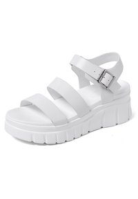 Sandali platform bianchi con tre fasce larghe e una fibbia. Realizzati in materiale liscio con una suola testurizzata e rigata.