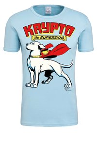 Light blue cotton t-shirt featuring a cartoon dog Krypto with a red cape, outlined in black. Text reads "KRYPT0 The Superdog" in bold colors.