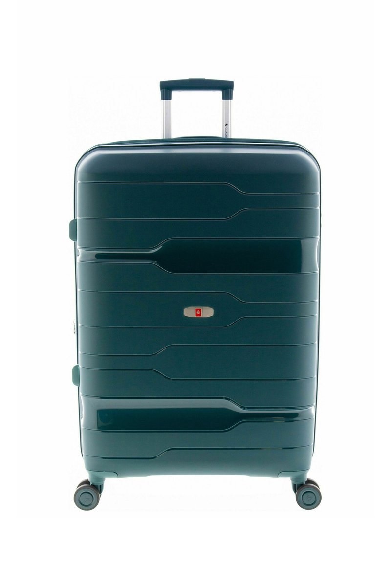 Harde koffer in donkergroen. Heeft getextureerde groeven, een telescopisch handvat en twee wielen voor mobiliteit. Inclusief een klein slot.
