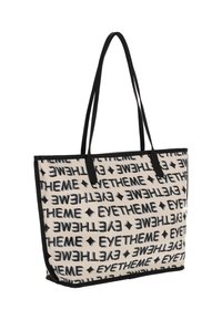Geantă tote cu fundal crem, text negru "EYETHEME" și accente de diamante, cu bretele negre și design structurat.