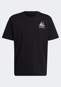 Svart kortärmad crew-neck t-shirt med en liten vit Adidas Adventure-logotyp och björngrafik på vänster bröst.