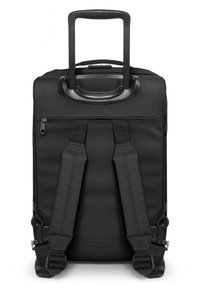 Zaino a ruote nero realizzato in tessuto resistente, con manico retrattile, spallacci imbottiti e tasca anteriore con zipper.
