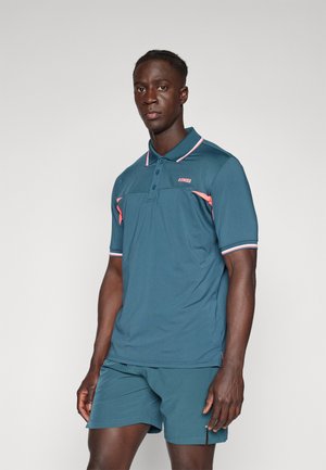 Teal polo shirt with pink accents, short sleeves, and a two-button placket. Paired with matching teal shorts. Smooth fabric texture.
