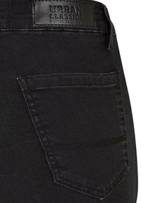 SUPER STRETCH - Jeans bootcut - black stone washed