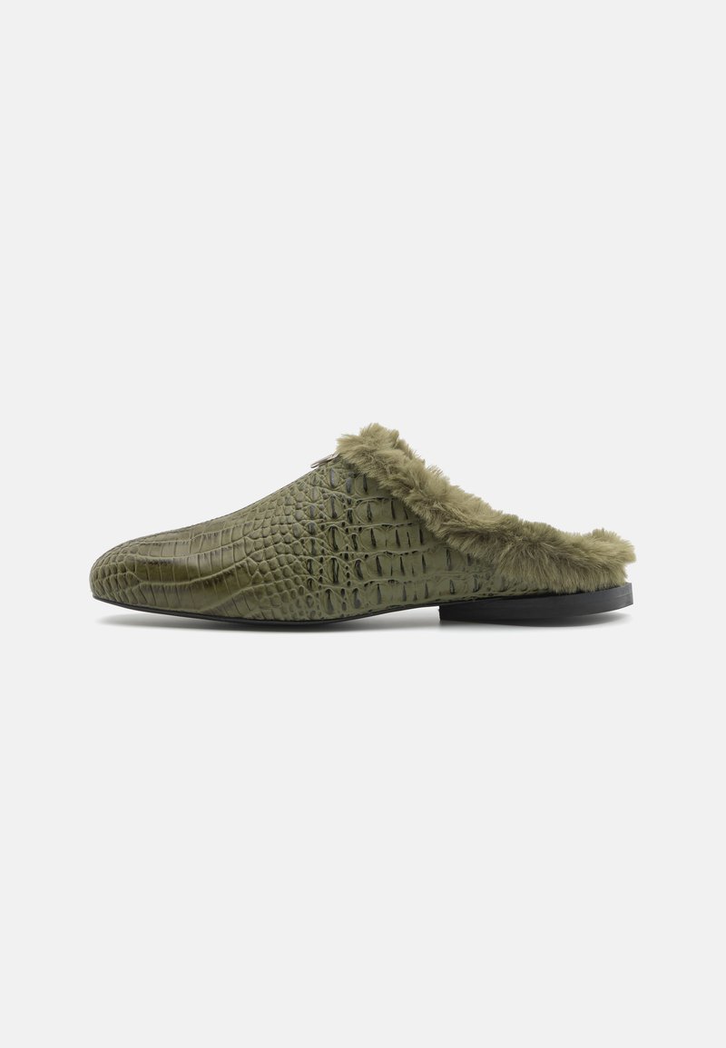 Olive green slip-on slippers with a textured crocodile pattern and faux fur trim around the opening. Black sole.