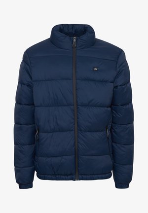 Námornícka pufrová bunda s vysokým golierom, predným zipsom a elastickými manžetami. Obsahuje prešívané panely a bočné vrecká so zipsami.