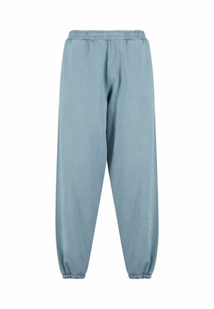 Light blue sweatpants made from soft fabric with an elastic waistband and cuffs, featuring a simple design and subtle logo detail on the side.