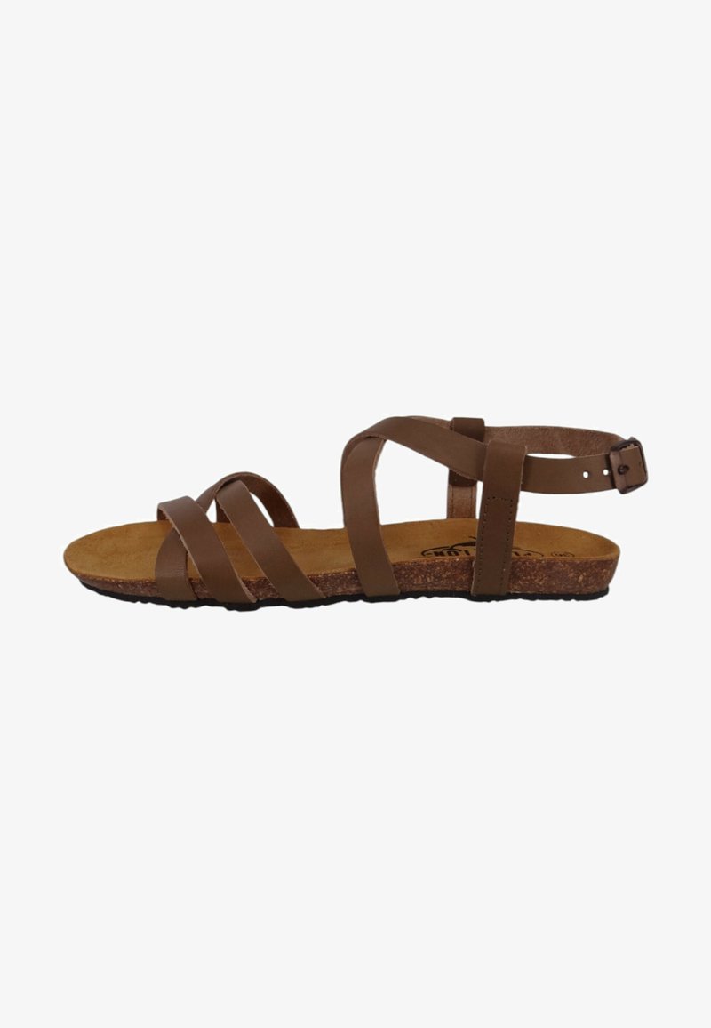 Brown leather sandal with multiple crisscross straps, a flat cork sole, and an adjustable ankle strap. Textured footbed for comfort.