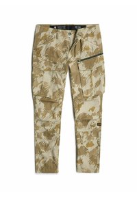 Beżowe spodnie cargo w kamuflażu z jasnobrązowymi akcentami. Zawierają wiele kieszeni, kieszeń na zamek oraz prosty krój nogawki.