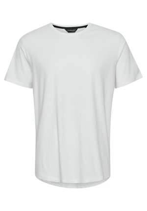 Bijela majica kratkih rukava s okruglim izrezom, izrađena od mekog pamučnog materijala. Ravnog kroja s blago zakrivljenim rubom. Minimalistički dizajn.