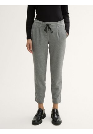 Gray checkered pants with a drawstring waist, tapered legs, and front pockets, paired with black shoes. Smooth fabric texture.