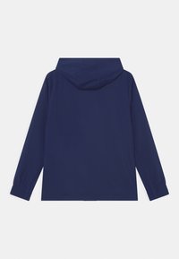 Navy blue hooded jacket with long sleeves, elastic cuffs, and a smooth texture. Features a relaxed fit and no visible hardware.