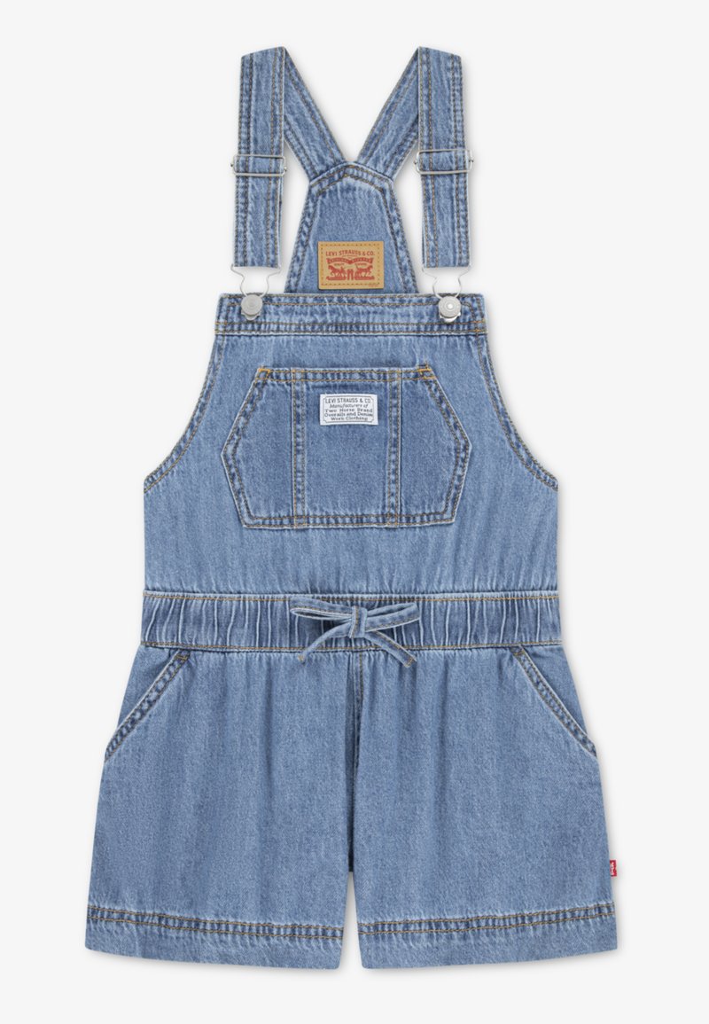 Σορτς ολόσωμο τζιν σε ανοιχτό μπλε, με ρυθμιζόμενους ιμάντες ώμων, μπροστινή τσέπη και ελαστική μέση με δέσιμο.