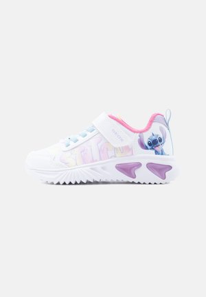 White children's sneaker with pink lining, purple accents, Velcro strap, and cartoon character Stitch graphic on the heel.