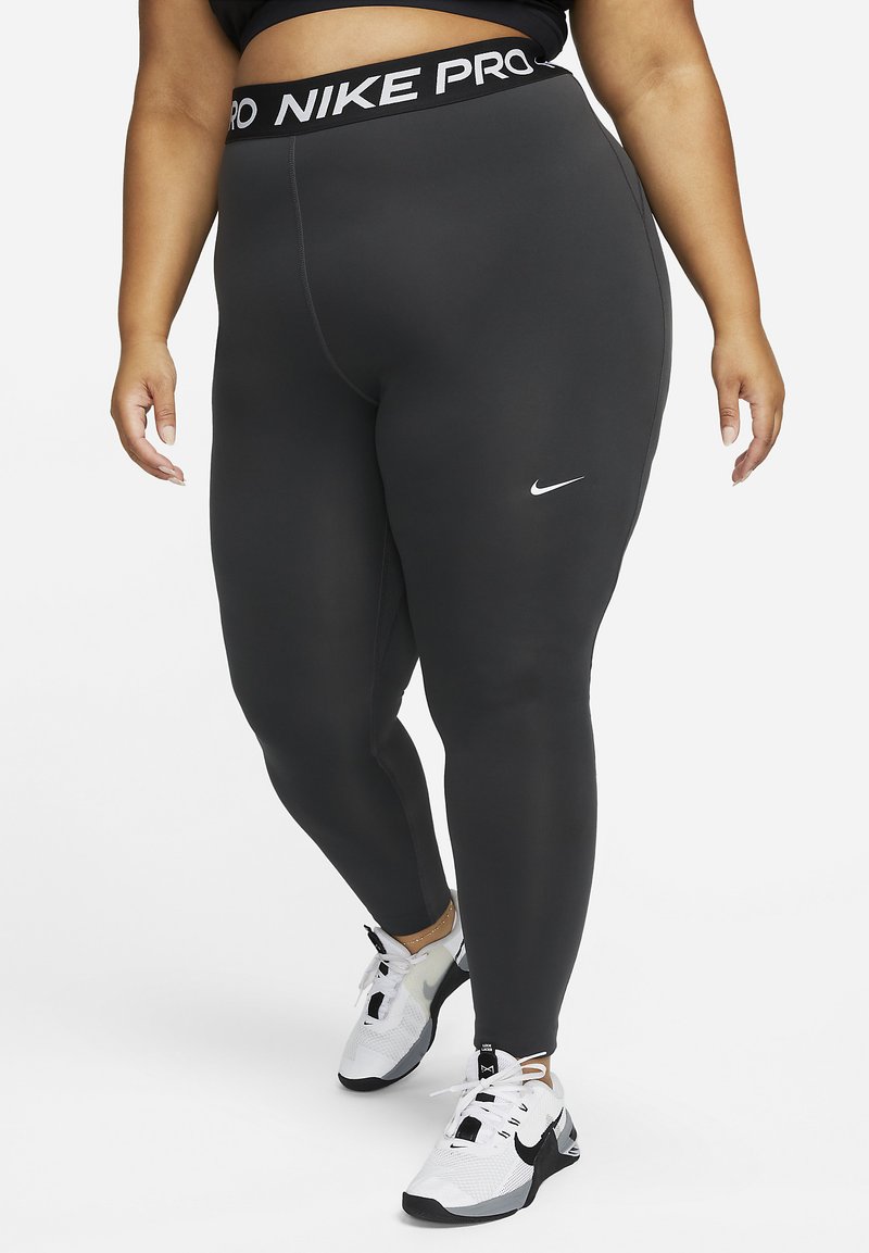 Nike Performance PLUS - Leggings - dk smoke grey/black/white