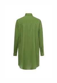 Lange mouwen shirt in effen groen, gemaakt van lichtgewicht stof. Voorzien van een kraag, knoopmanchetten en een rechte achterkant voor een comfortabele pasvorm.