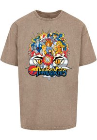 Rudas medvilnės marškinėliai su spalvinga "ThunderCats" grafika, vaizduojančia veikėjus ir elementus apskritimo dizainu, ryškiomis akimis ir gyvybingais detalėmis.