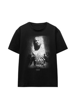 Black short-sleeve t-shirt with a grayscale graphic of a person trapped in carbonite and a small Star Wars logo below the image.