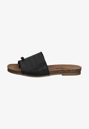 Sandal noir à glissière avec un dessus synthétique embossé de crocodile, doté d'une ouverture à l'avant et d'une semelle intérieure texturée en liège pour un confort optimal. Semelle profil bas.