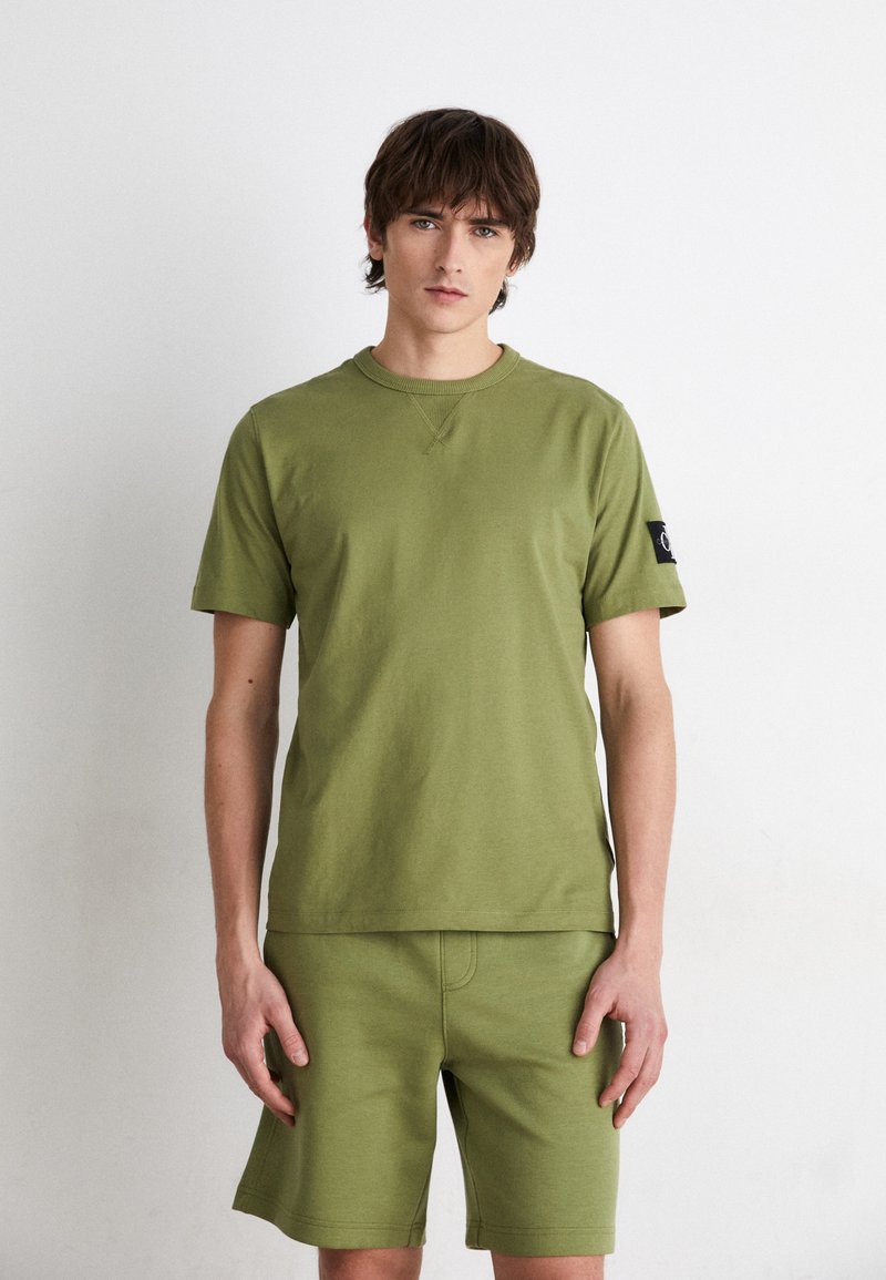 Calvin Klein Jeans BADGE REGULAR TEE - Basic póló - dark juniper