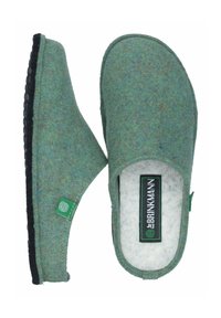 Green felt slippers with a soft texture, rounded shape, and black rubber sole. Features a small green branding tag on the side.