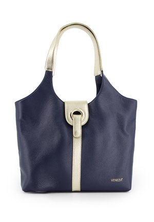 Sac à main en cuir marine avec un accent doré et un fermoir circulaire. Doté d'une surface texturée et d'une bandoulière confortable.