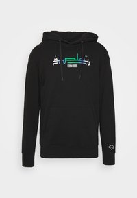 Sudadera negra con capucha y bolsillo delantero, con un gráfico de texto colorido "DENIM GOODS" y logo en la manga izquierda. Diseño suave y de tipo pulóver.