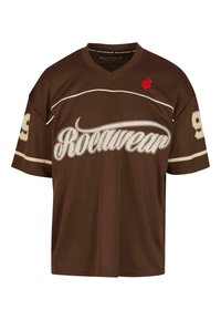 Barna hálós, rövid ujjú mez fehér "Rocawear" logóval és piros kiegészítővel. V-nyakú, és nagy 99-es szám található az ujjakon.