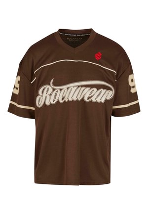Brązowy siateczkowy t-shirt z krótkim rękawem z białym logo "Rocawear" i czerwonym akcentem. Posiada dekolt w serek i duży numer 99 na rękawach.
