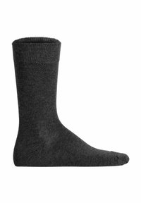 Grå bomuldsstrømpe med ribbet top, midt på læggen, flad tåsøm og en glat tekstur. Simpelt design, ingen mønstre eller detaljer.
