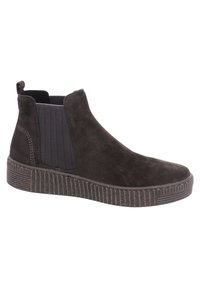 Schwarze Wildleder-Stiefeletten mit elastischen seitlichen Einsätzen, einer strukturierten Sohle und einem niedrigen Plateau-Design. Genähte Akzente entlang der Nähte.