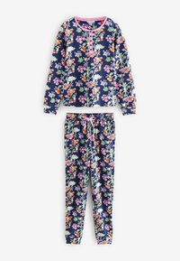 Lilleline pidžaamakomplekt pika varrukaga topi ja pükstega. Tumesinine kangas, kaetud värvikate lilledega, roosa kaelus ja nöörvöö koha peal.