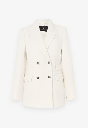 Dvojradový blejzer z textúrovaného bieleho materiálu. Obsahuje čierne kovové gombíky, dve predné vrecká a klopový golier.