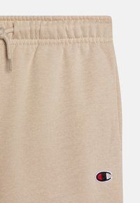 Champion ICONS CUFF PANTS CONTRAST LOGO UNISEX - Treniņtērpa apakšdaļas - beige