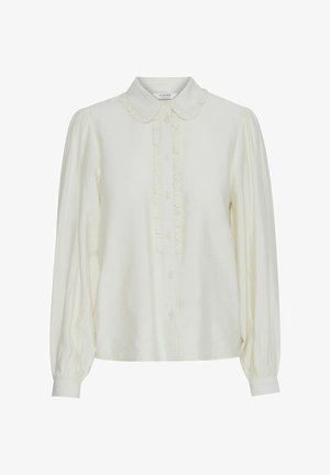 Cream blouse with a ruffled collar, front button closure, long puff sleeves, and a soft, textured fabric. Elegant and minimalist design.