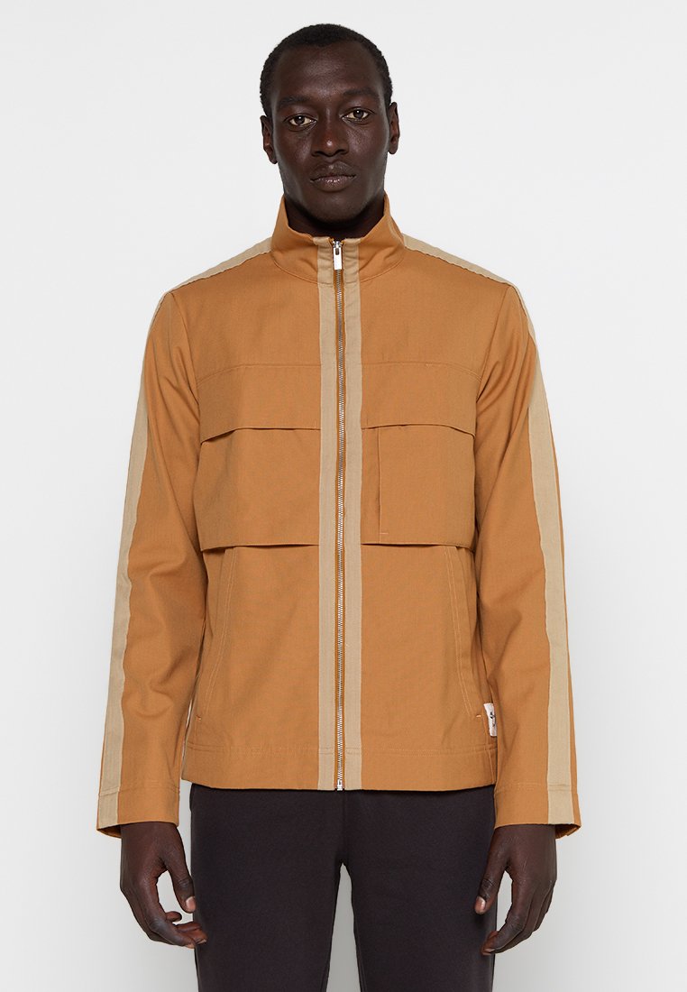 Icebreaker Lichte jas lichtbruin Icebreaker Lichte jas lichtbruin