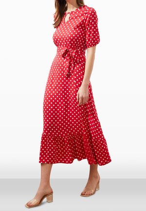 Rode midi-jurk met witte stippen, pofmouwen, een keyhole-hals en een taille met strikdetail, voorzien van een gerimpelde zoom en lichtgewicht stof.