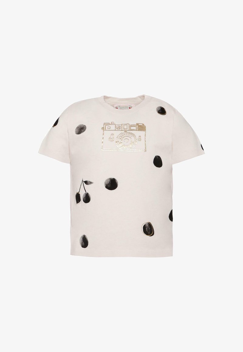 T-shirt beige chiaro in cotone, con grafica di una macchina fotografica nera e oro e motivi circolari color oliva. Maniche corte e scollatura rotonda.