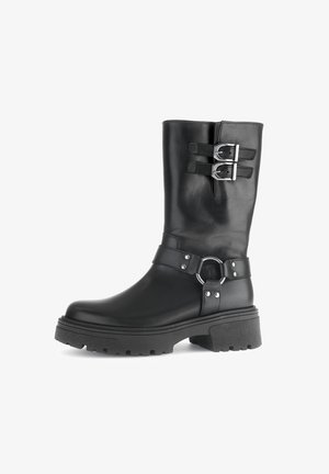 Black mid-calf leather boot with double silver buckle straps at the top, a silver ring detail, and a chunky textured sole.