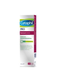 Cetaphil PRO Redness Control cream, 30 ml, features a rectangular box with a white background, green and purple accents, and product information in German.