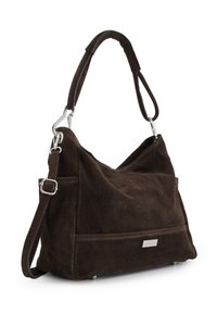 Brown suede handbag with a slouchy design, short handle, adjustable shoulder strap, and silver hardware accents. Flat base with small feet.